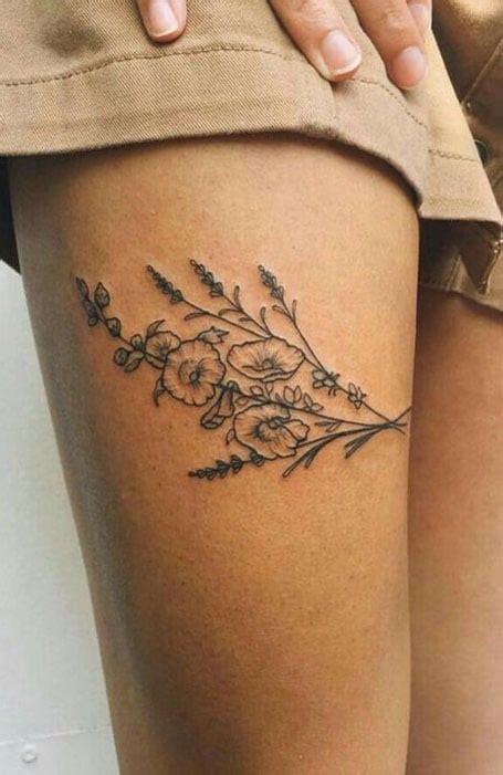 51 Sexy Thigh Tattoos For Women + Cute Designs。